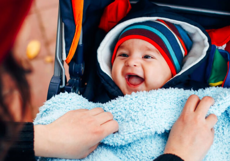 Iki kokios minusinės temperatūros galima su naujagimiu į lauką